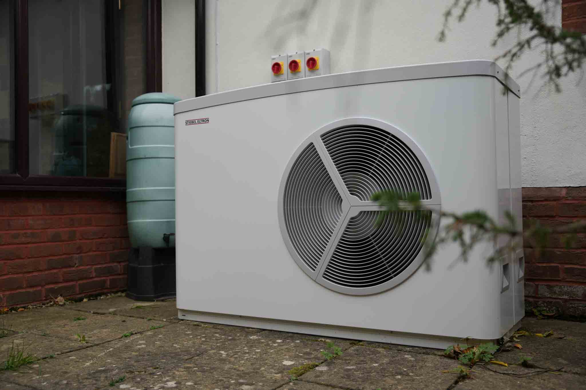 steibel eltron air-source heat pump outside home
