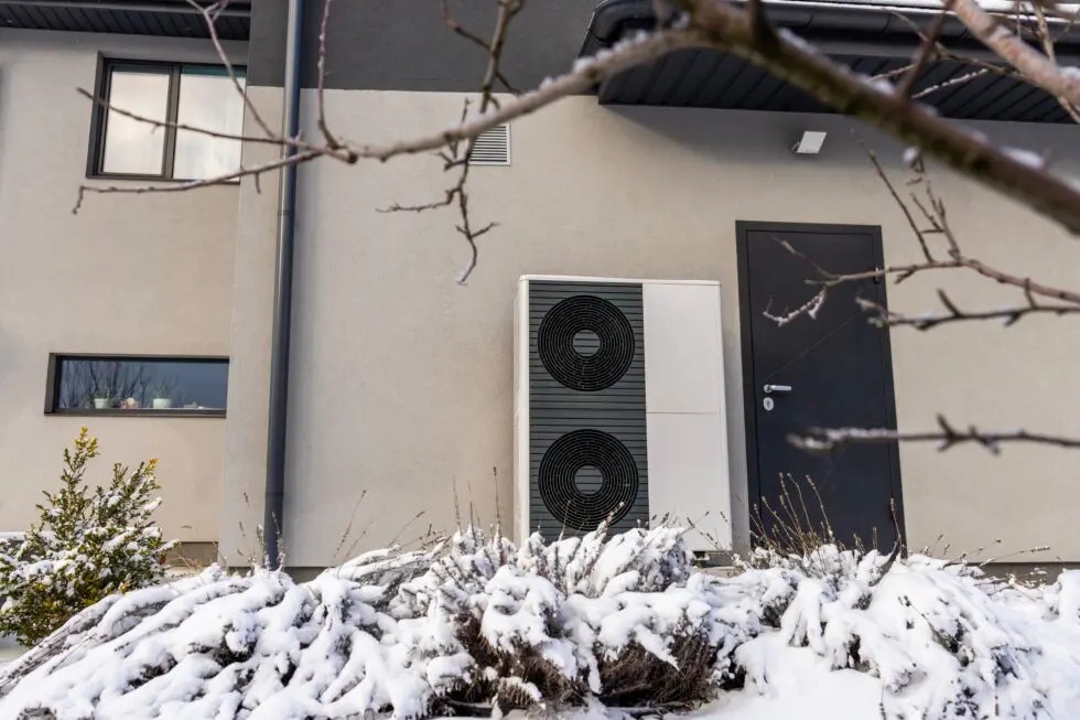ashp air source heat pump during winter snow