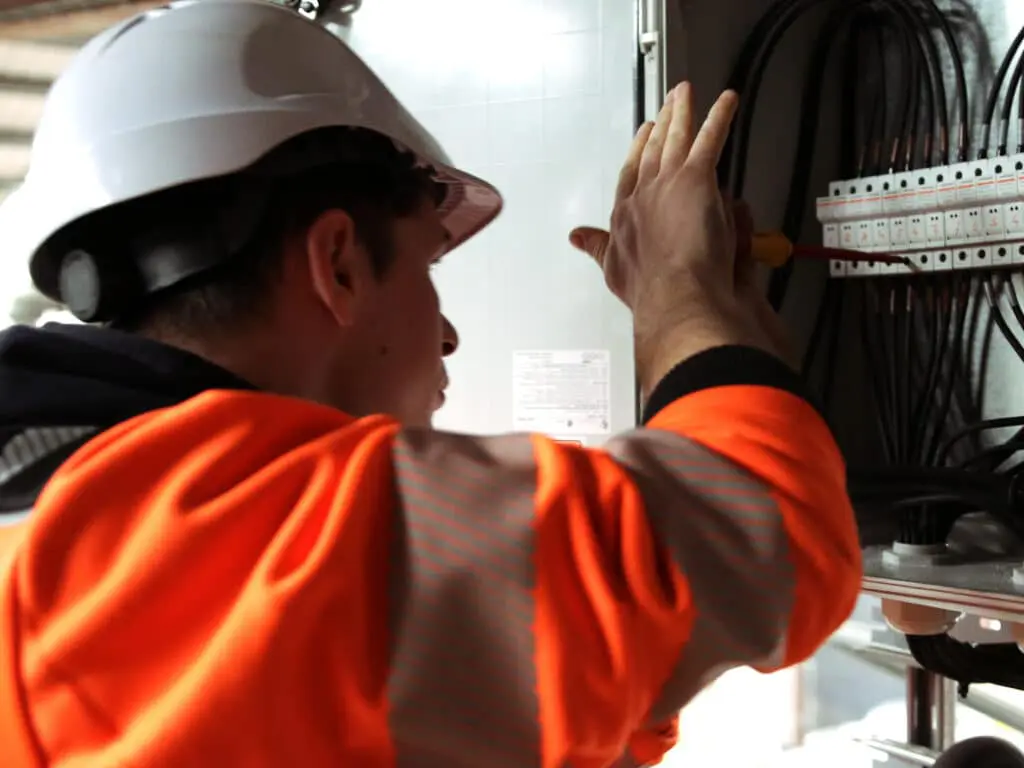 electrical contractor at work with PPE