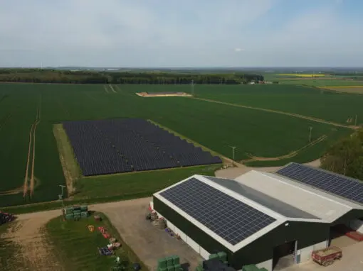 birds-eye view of rooftop and ground mount