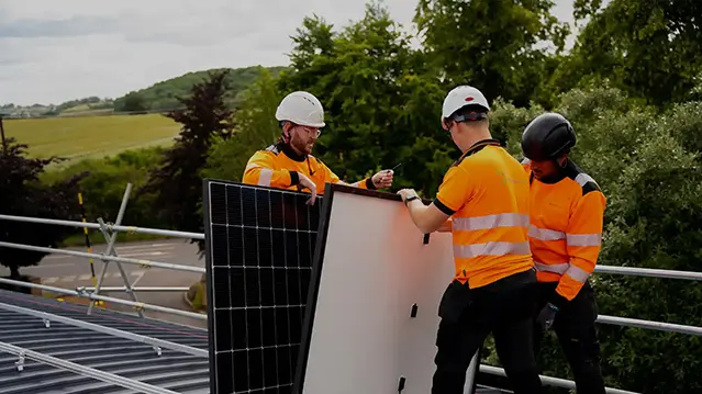 Solar panel installation team