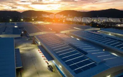 commercial solar panels on warehouses with sunlight