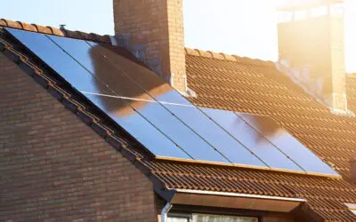 sunlight hitting solar panels on a house