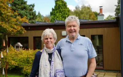 happy couple after solar installation for their home