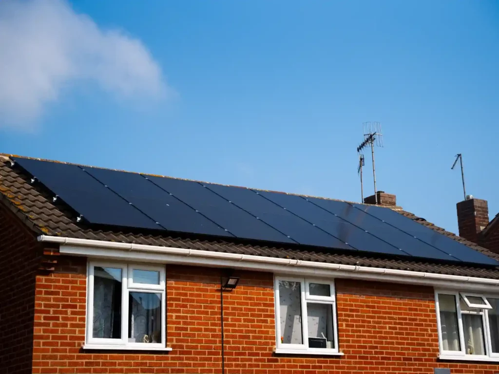 solar panels on a home with a blue sky
