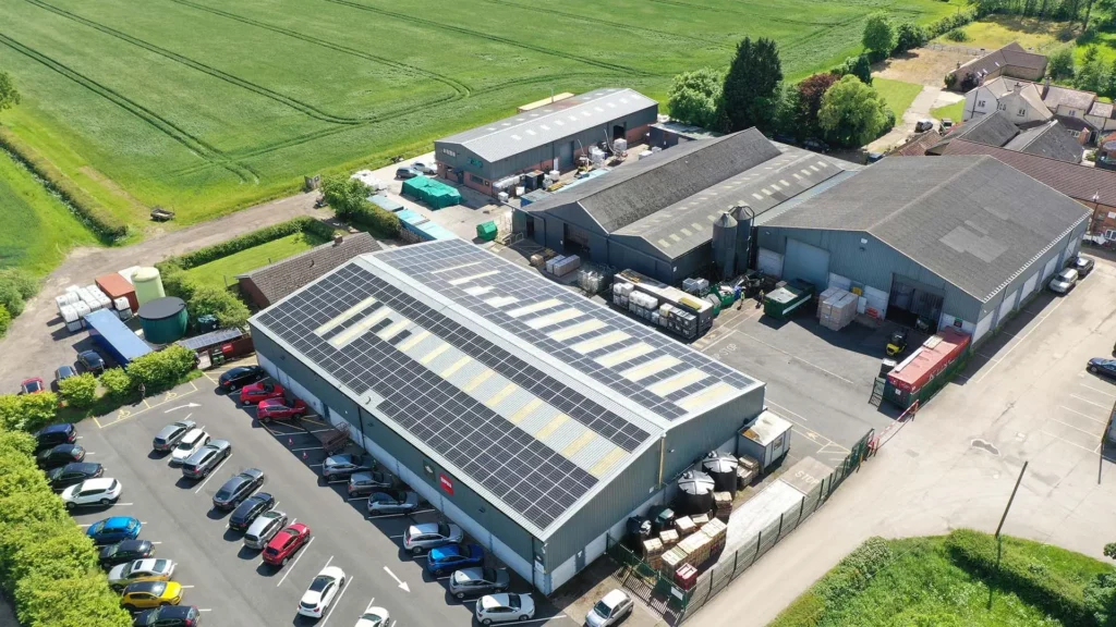 commercial solar panels on a building in the summer
