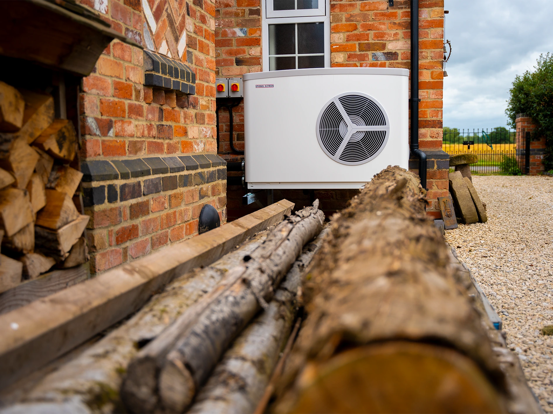 air source heat pump outside a house